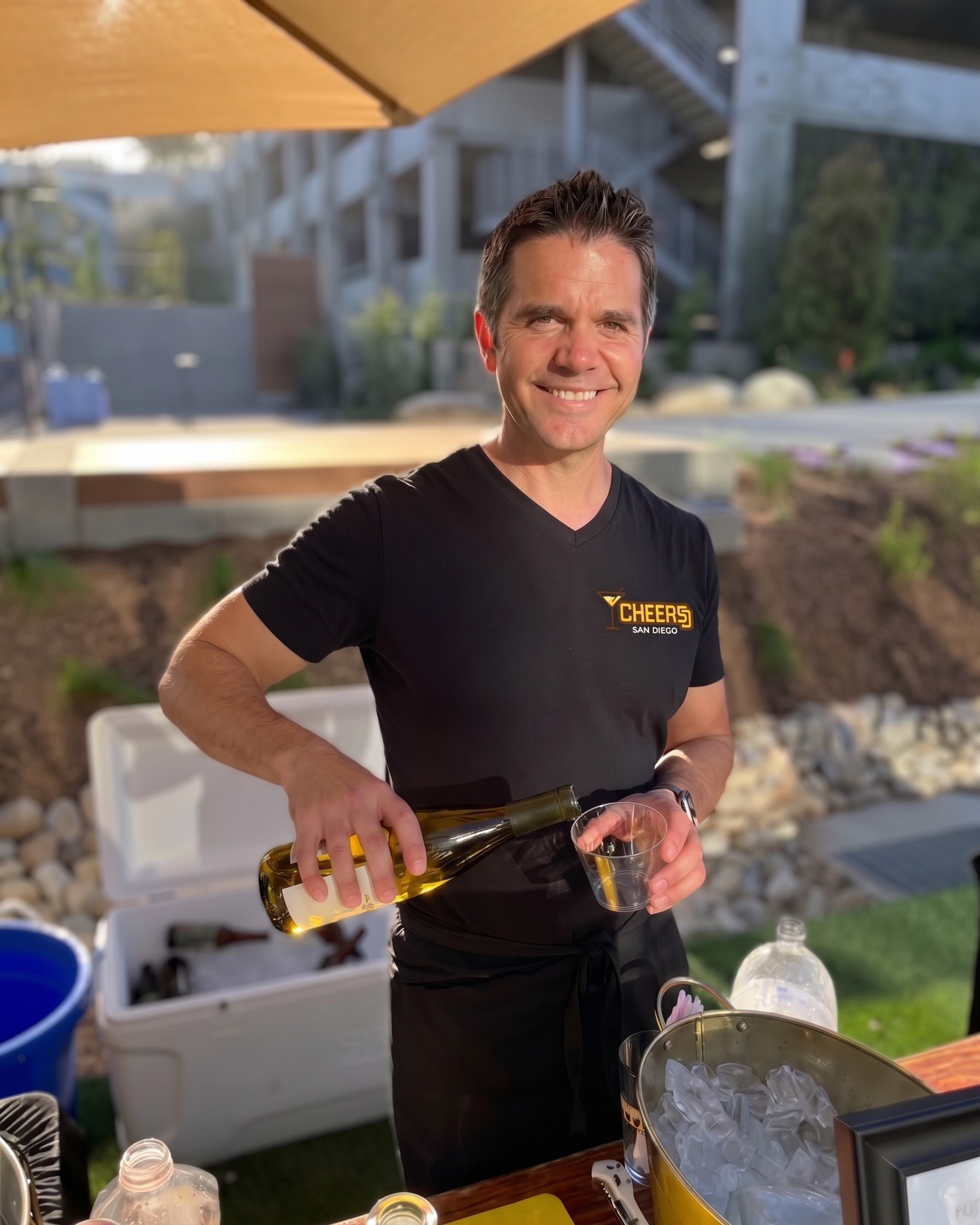 Justin, owner of Cheers San Diego, bartending a corporate happy hour for 858 Therapeutics in Del Mar, CA